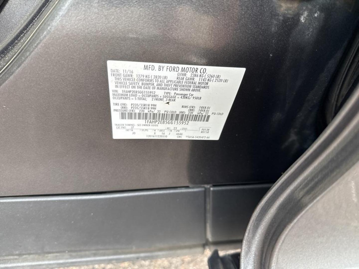 2016 GRAY Ford Taurus SEL (1FAHP2E85GG) with an V6, 3.5L engine, Automatic transmission, located at 10890 W. Colfax Ave., Lakewood, CO, 80215, (303) 274-7692, 39.739914, -105.120132 - Photo#51