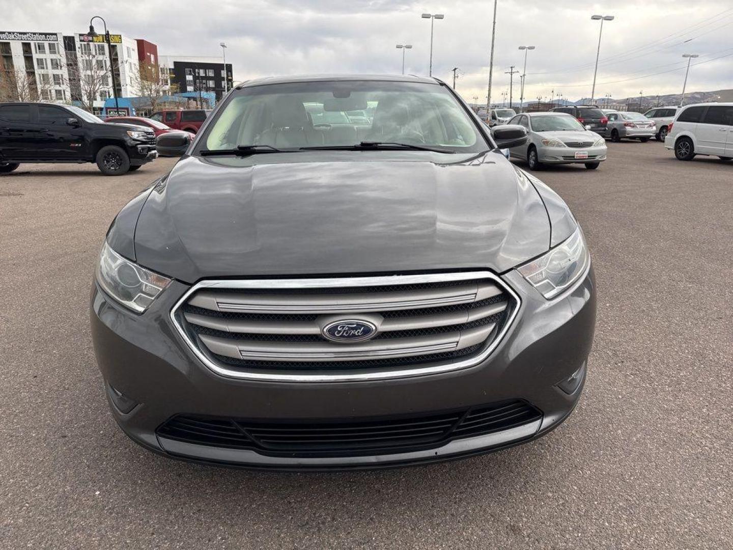 2016 GRAY Ford Taurus SEL (1FAHP2E85GG) with an V6, 3.5L engine, Automatic transmission, located at 10890 W. Colfax Ave., Lakewood, CO, 80215, (303) 274-7692, 39.739914, -105.120132 - Photo#1