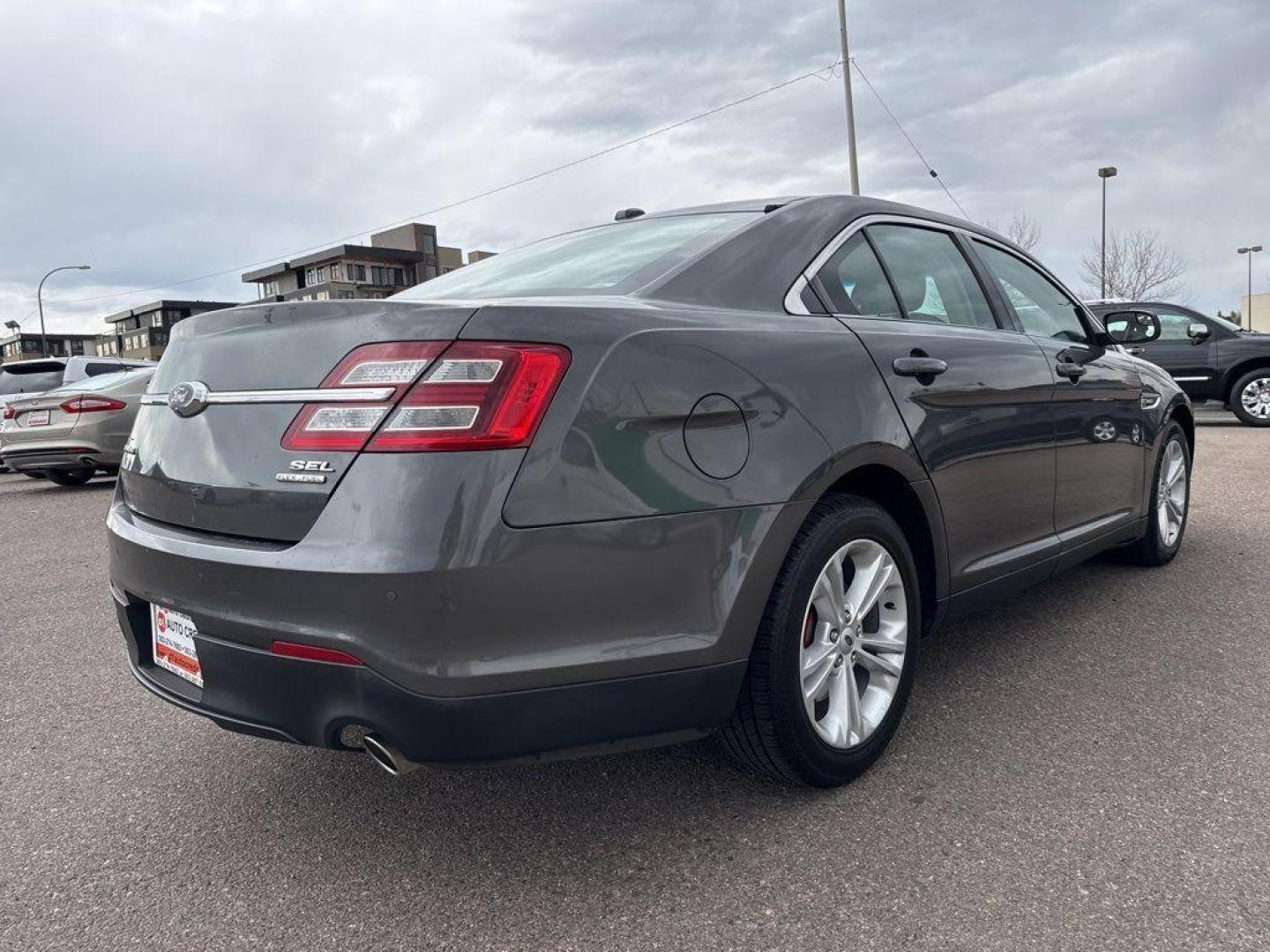 2016 GRAY Ford Taurus SEL (1FAHP2E85GG) with an V6, 3.5L engine, Automatic transmission, located at 10890 W. Colfax Ave., Lakewood, CO, 80215, (303) 274-7692, 39.739914, -105.120132 - Photo#4