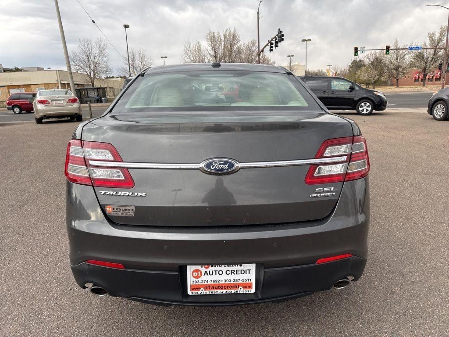 2016 GRAY Ford Taurus SEL (1FAHP2E85GG) with an V6, 3.5L engine, Automatic transmission, located at 10890 W. Colfax Ave., Lakewood, CO, 80215, (303) 274-7692, 39.739914, -105.120132 - Photo#5