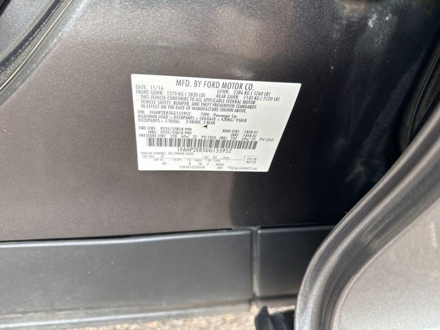 2016 GRAY Ford Taurus SEL (1FAHP2E85GG) with an V6, 3.5L engine, Automatic transmission, located at 10890 W. Colfax Ave., Lakewood, CO, 80215, (303) 274-7692, 39.739914, -105.120132 - Photo#24