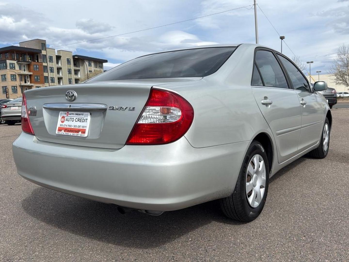 2002 SILVER Toyota Camry LE (JTDBE32K520) with an 4 Cyl, 2.4L engine, Automatic transmission, located at 10890 W. Colfax Ave., Lakewood, CO, 80215, (303) 274-7692, 39.739914, -105.120132 - Photo#5