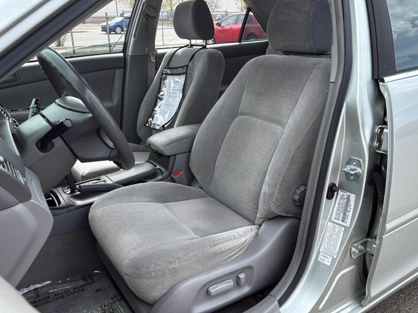 2002 SILVER Toyota Camry LE (JTDBE32K520) with an 4 Cyl, 2.4L engine, Automatic transmission, located at 10890 W. Colfax Ave., Lakewood, CO, 80215, (303) 274-7692, 39.739914, -105.120132 - Photo#10