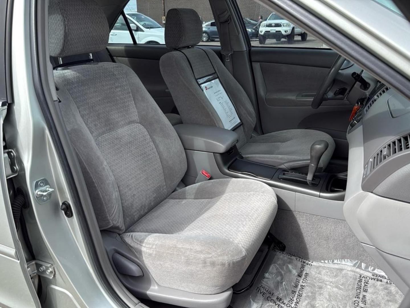 2002 SILVER Toyota Camry LE (JTDBE32K520) with an 4 Cyl, 2.4L engine, Automatic transmission, located at 10890 W. Colfax Ave., Lakewood, CO, 80215, (303) 274-7692, 39.739914, -105.120132 - Photo#11