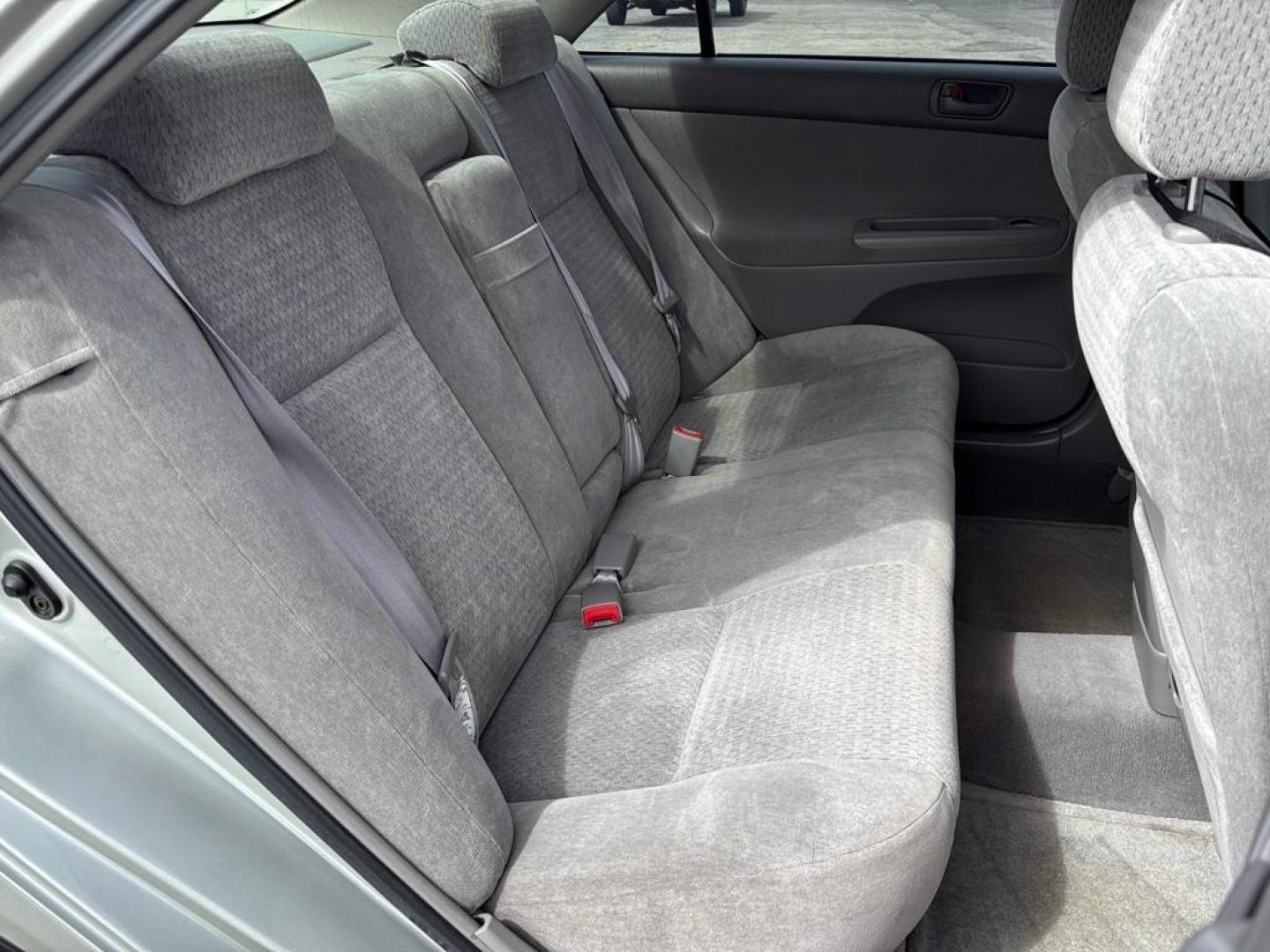 2002 SILVER Toyota Camry LE (JTDBE32K520) with an 4 Cyl, 2.4L engine, Automatic transmission, located at 10890 W. Colfax Ave., Lakewood, CO, 80215, (303) 274-7692, 39.739914, -105.120132 - Photo#12