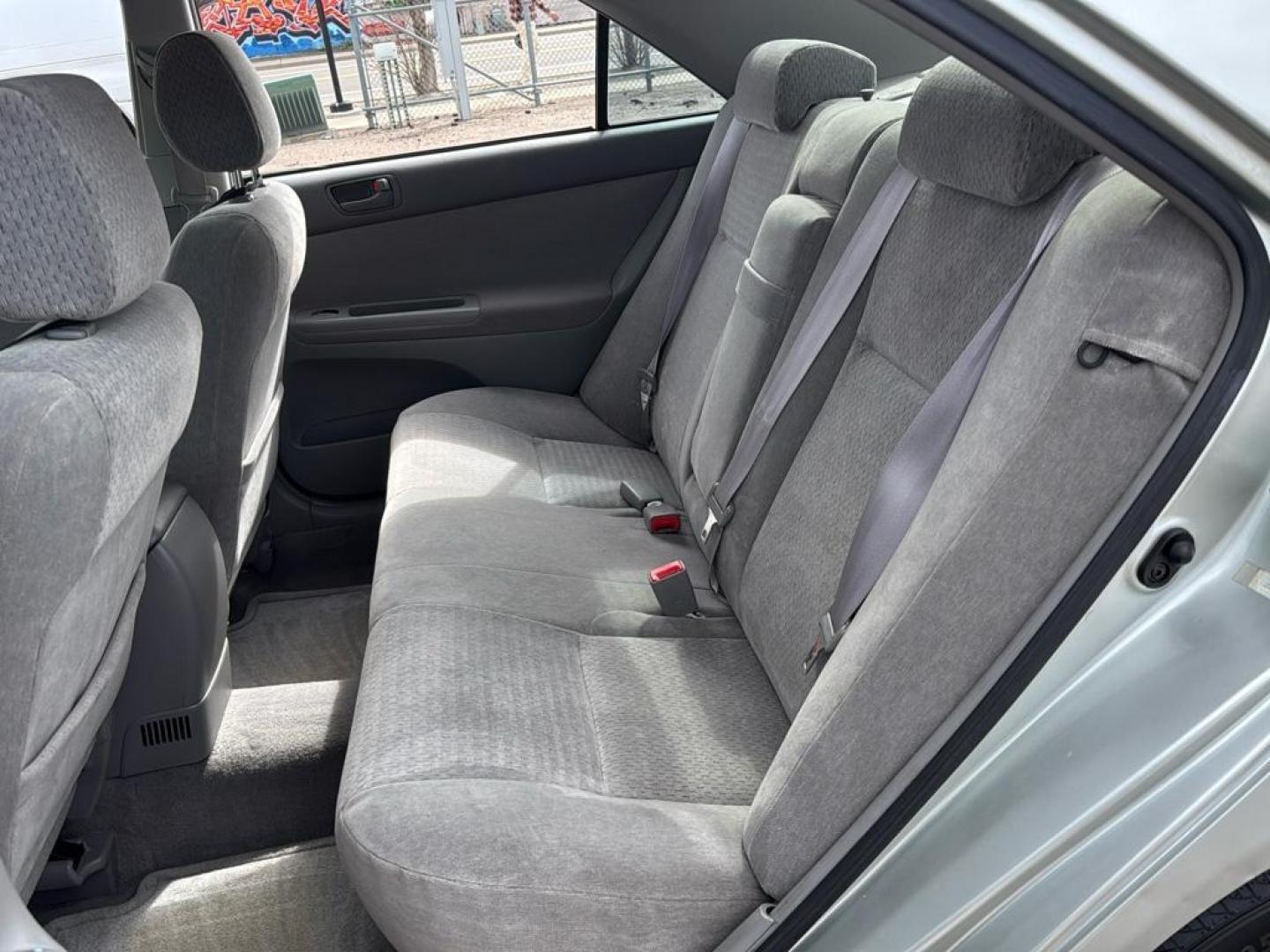 2002 SILVER Toyota Camry LE (JTDBE32K520) with an 4 Cyl, 2.4L engine, Automatic transmission, located at 10890 W. Colfax Ave., Lakewood, CO, 80215, (303) 274-7692, 39.739914, -105.120132 - Photo#13