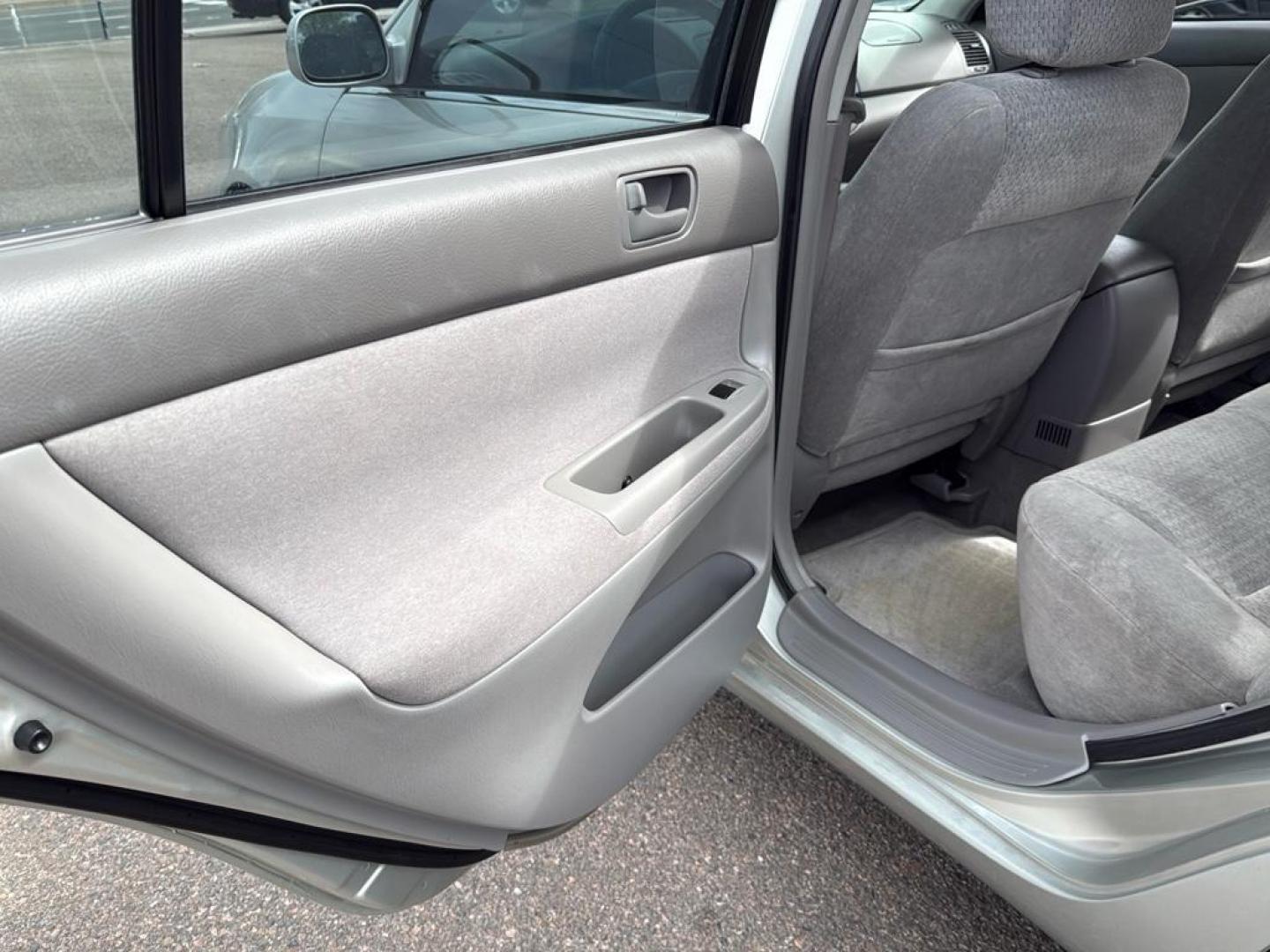 2002 SILVER Toyota Camry LE (JTDBE32K520) with an 4 Cyl, 2.4L engine, Automatic transmission, located at 10890 W. Colfax Ave., Lakewood, CO, 80215, (303) 274-7692, 39.739914, -105.120132 - Photo#21