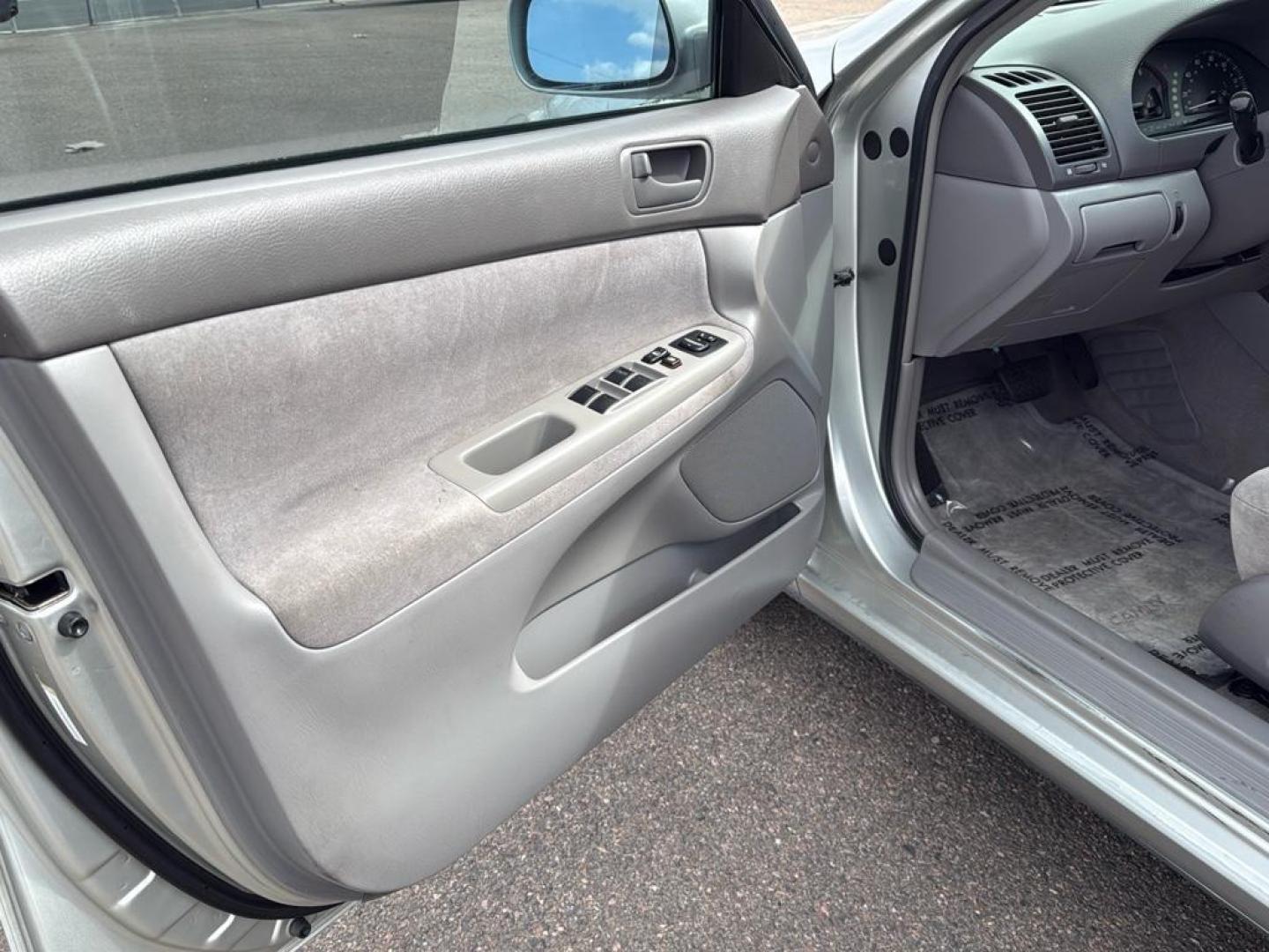 2002 SILVER Toyota Camry LE (JTDBE32K520) with an 4 Cyl, 2.4L engine, Automatic transmission, located at 10890 W. Colfax Ave., Lakewood, CO, 80215, (303) 274-7692, 39.739914, -105.120132 - Photo#22