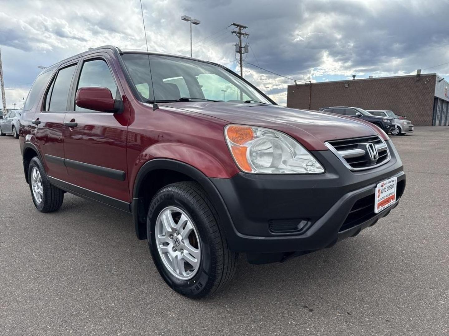 2004 Chianti Red Pearl /Saddle Honda CR-V EX (JHLRD78854C) with an 2.4L I4 SMPI DOHC engine, Automatic transmission, located at 10890 W. Colfax Ave., Lakewood, CO, 80215, (303) 274-7692, 39.739914, -105.120132 - 2004 Honda CR-V AWD AWD.<br><br>D1 Auto NEVER charges dealer fees! All cars have clean titles and have been inspected for mechanical issues. We have financing for everyone. Good credit, bad credit, first time buyers.<br><br>Please call Lakewood Location 303-274-7692 or Thornton 303-287-5511 to sched - Photo#2