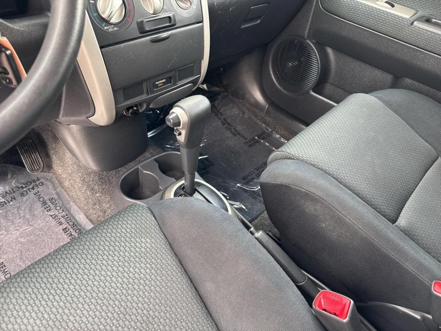 2006 SILVER Scion xB Base (JTLKT324364) with an 4 Cyl, 1.5L engine, Automatic transmission, located at 10890 W. Colfax Ave., Lakewood, CO, 80215, (303) 274-7692, 39.739914, -105.120132 - Photo#37