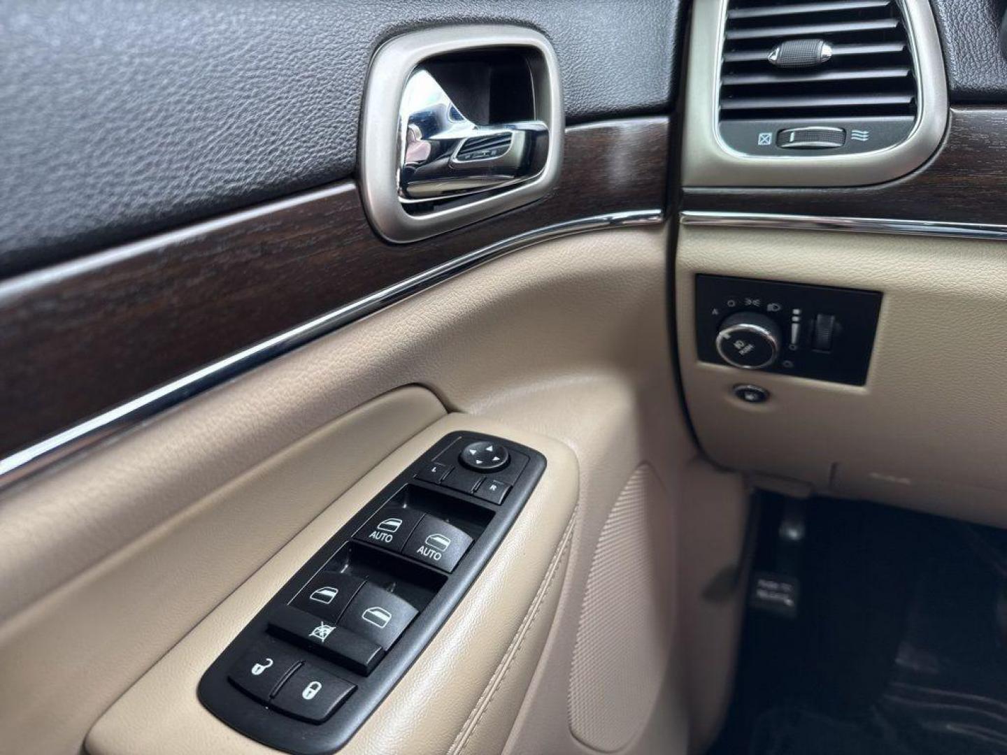 2014 BLUE Jeep Grand Cherokee Limited (1C4RJFBG1EC) with an V6, 3.6L engine, Automatic transmission, located at 10890 W. Colfax Ave., Lakewood, CO, 80215, (303) 274-7692, 39.739914, -105.120132 - Photo#31