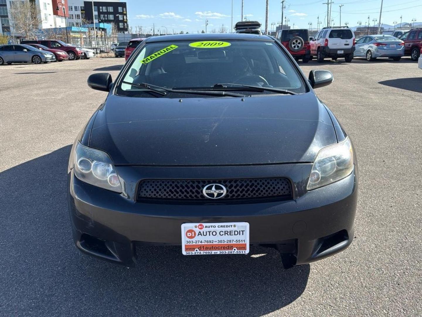 2009 BLACK Scion tC Base (JTKDE167990) with an 4 Cyl, 2.4L engine, Manual transmission, located at 10890 W. Colfax Ave., Lakewood, CO, 80215, (303) 274-7692, 39.739914, -105.120132 - Photo#1