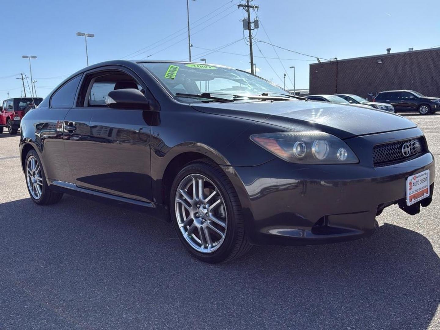2009 BLACK Scion tC Base (JTKDE167990) with an 4 Cyl, 2.4L engine, Manual transmission, located at 10890 W. Colfax Ave., Lakewood, CO, 80215, (303) 274-7692, 39.739914, -105.120132 - Photo#2