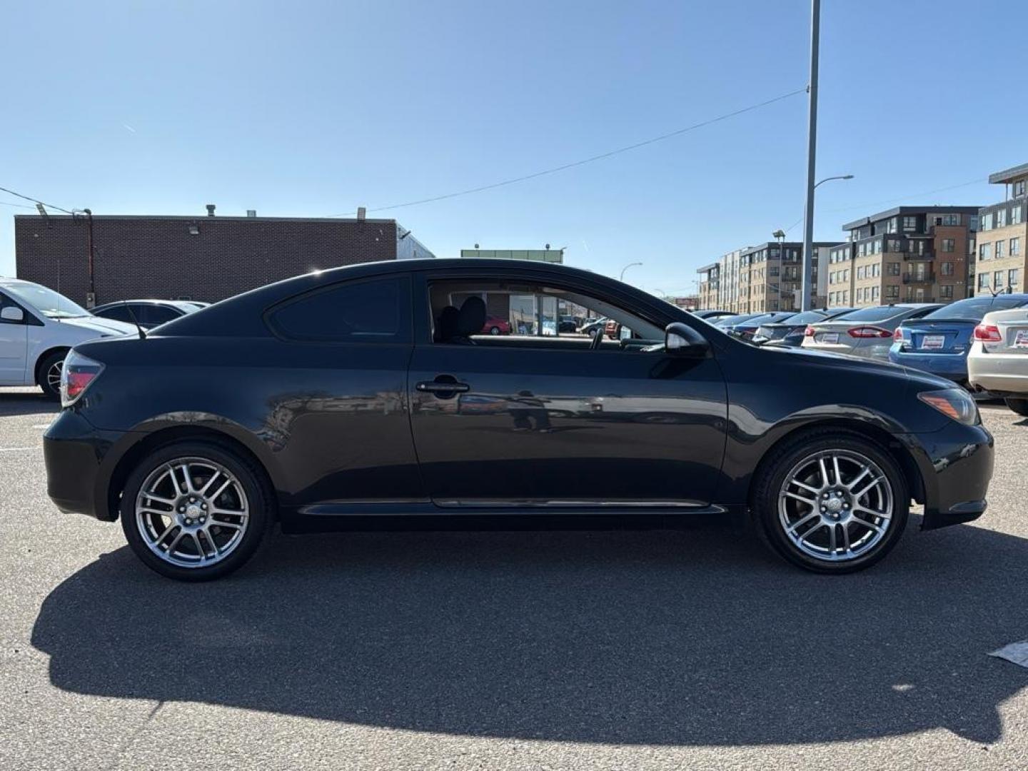 2009 BLACK Scion tC Base (JTKDE167990) with an 4 Cyl, 2.4L engine, Manual transmission, located at 10890 W. Colfax Ave., Lakewood, CO, 80215, (303) 274-7692, 39.739914, -105.120132 - Photo#3