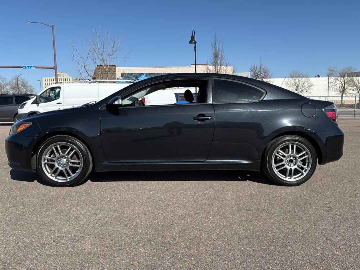2009 BLACK Scion tC Base (JTKDE167990) with an 4 Cyl, 2.4L engine, Manual transmission, located at 10890 W. Colfax Ave., Lakewood, CO, 80215, (303) 274-7692, 39.739914, -105.120132 - Photo#7