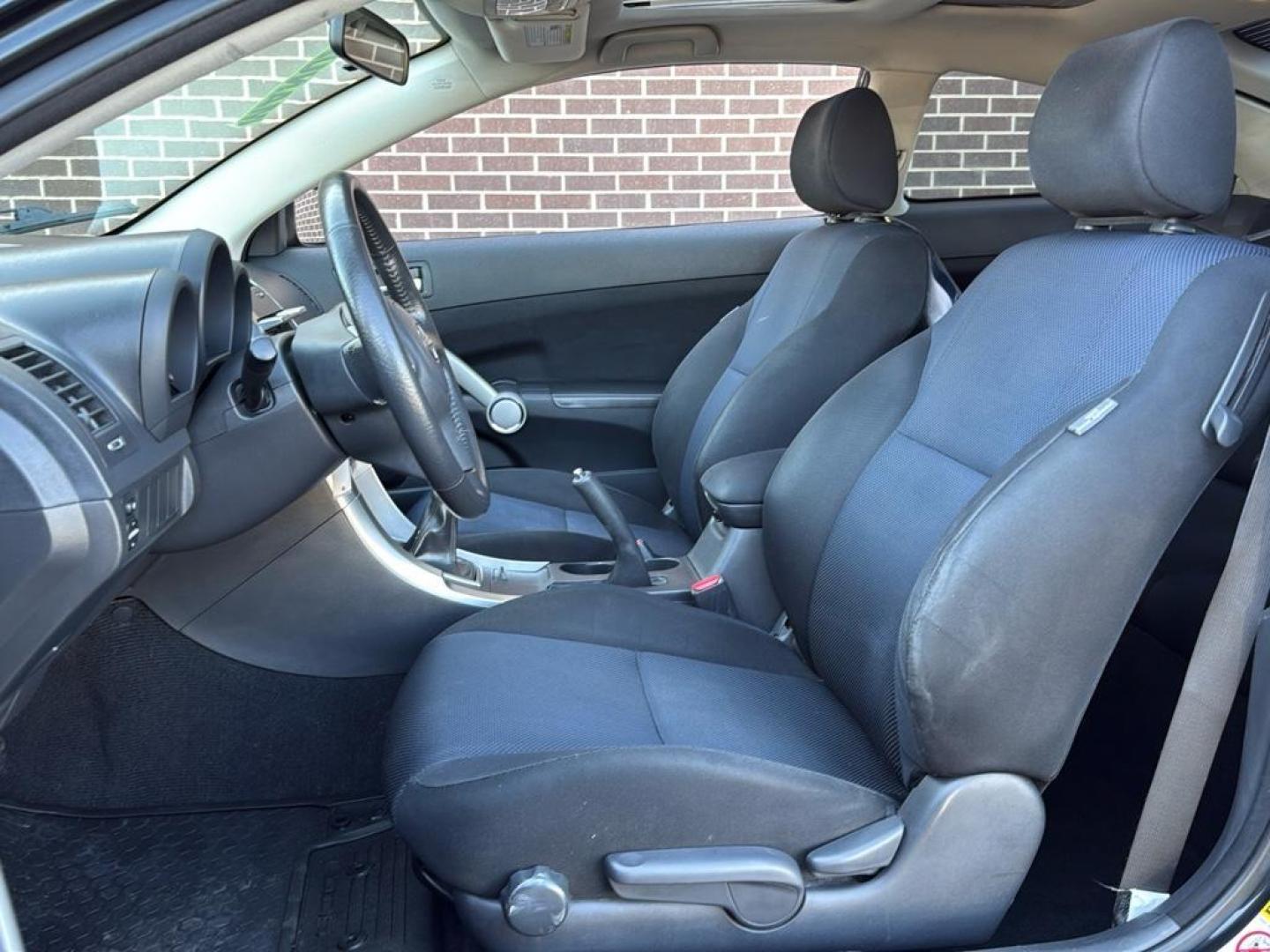 2009 BLACK Scion tC Base (JTKDE167990) with an 4 Cyl, 2.4L engine, Manual transmission, located at 10890 W. Colfax Ave., Lakewood, CO, 80215, (303) 274-7692, 39.739914, -105.120132 - Photo#13