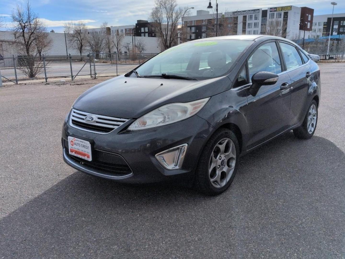2013 BLUE Ford Fiesta Titanium (3FADP4CJ7DM) with an 4 Cyl, 1.6L engine, Manual transmission, located at 10890 W. Colfax Ave., Lakewood, CO, 80215, (303) 274-7692, 39.739914, -105.120132 - Photo#0