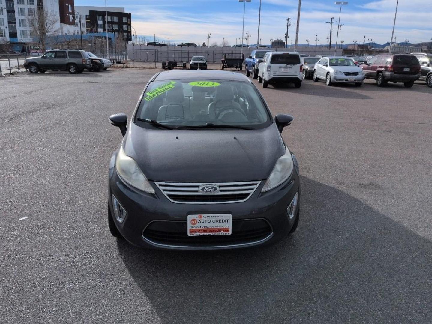 2013 BLUE Ford Fiesta Titanium (3FADP4CJ7DM) with an 4 Cyl, 1.6L engine, Manual transmission, located at 10890 W. Colfax Ave., Lakewood, CO, 80215, (303) 274-7692, 39.739914, -105.120132 - Photo#1