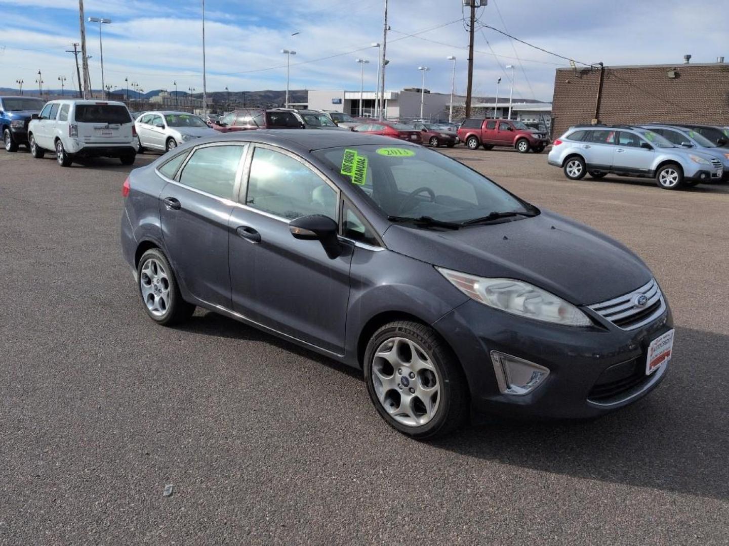 2013 BLUE Ford Fiesta Titanium (3FADP4CJ7DM) with an 4 Cyl, 1.6L engine, Manual transmission, located at 10890 W. Colfax Ave., Lakewood, CO, 80215, (303) 274-7692, 39.739914, -105.120132 - Photo#2