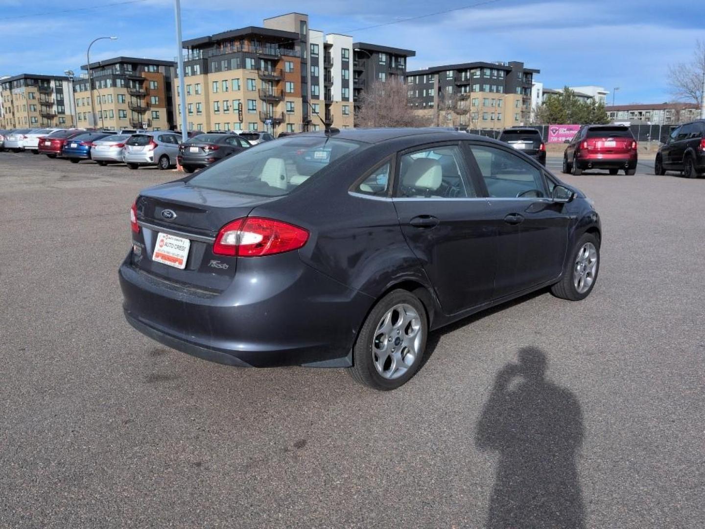 2013 BLUE Ford Fiesta Titanium (3FADP4CJ7DM) with an 4 Cyl, 1.6L engine, Manual transmission, located at 10890 W. Colfax Ave., Lakewood, CO, 80215, (303) 274-7692, 39.739914, -105.120132 - Photo#4
