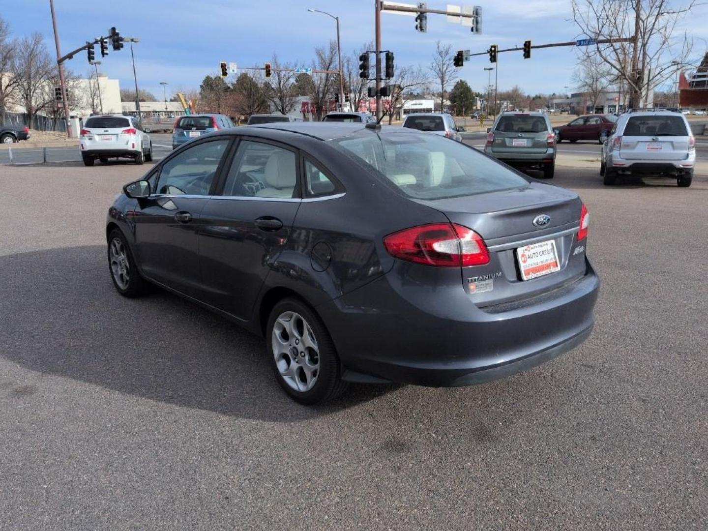 2013 BLUE Ford Fiesta Titanium (3FADP4CJ7DM) with an 4 Cyl, 1.6L engine, Manual transmission, located at 10890 W. Colfax Ave., Lakewood, CO, 80215, (303) 274-7692, 39.739914, -105.120132 - Photo#6