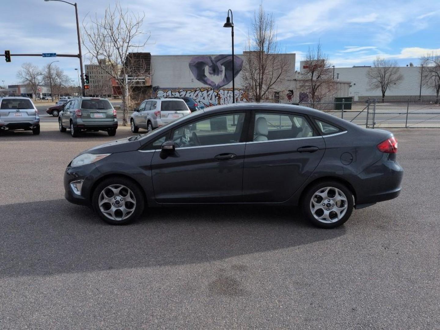 2013 BLUE Ford Fiesta Titanium (3FADP4CJ7DM) with an 4 Cyl, 1.6L engine, Manual transmission, located at 10890 W. Colfax Ave., Lakewood, CO, 80215, (303) 274-7692, 39.739914, -105.120132 - Photo#7