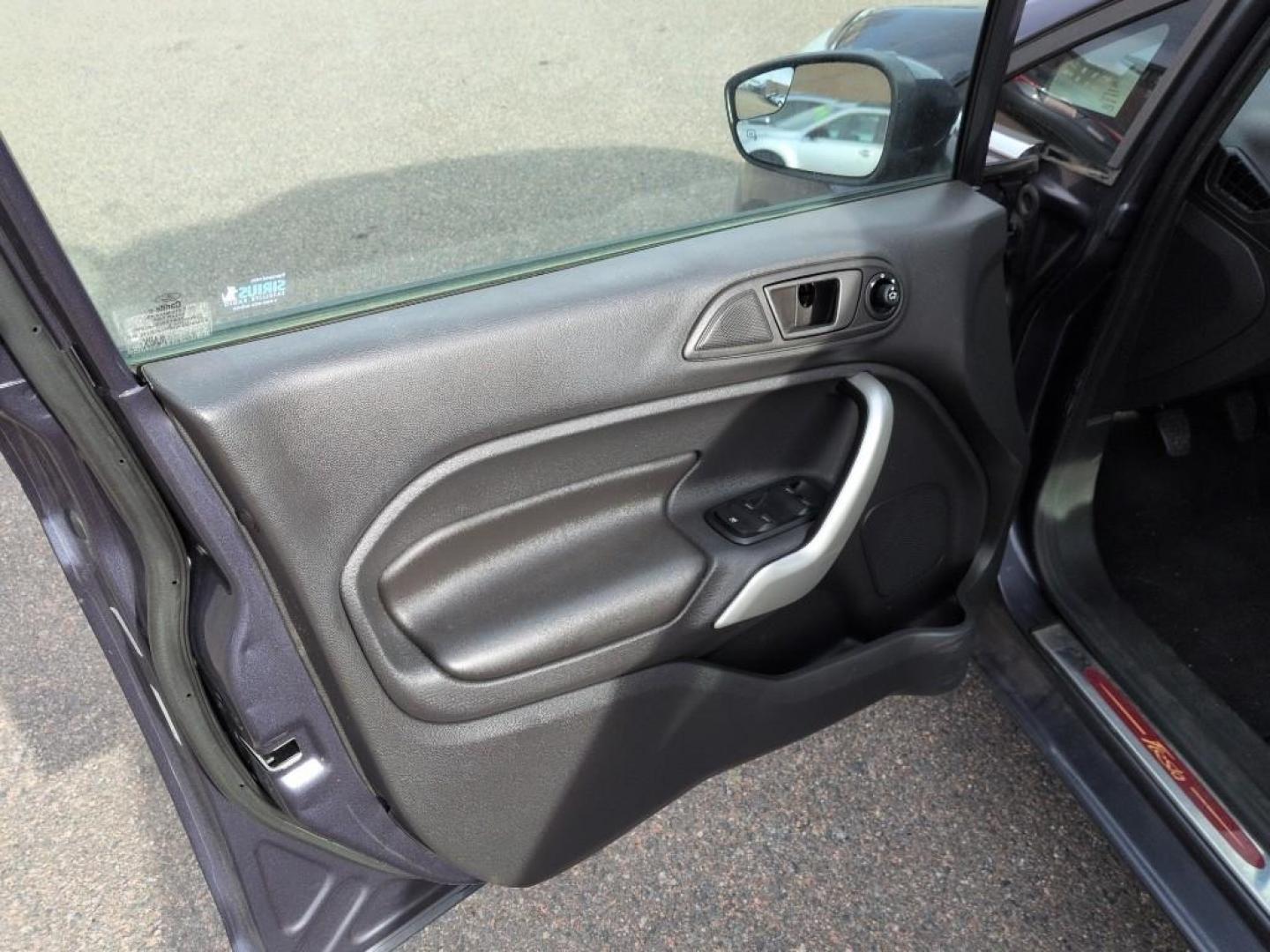 2013 BLUE Ford Fiesta Titanium (3FADP4CJ7DM) with an 4 Cyl, 1.6L engine, Manual transmission, located at 10890 W. Colfax Ave., Lakewood, CO, 80215, (303) 274-7692, 39.739914, -105.120132 - Photo#8