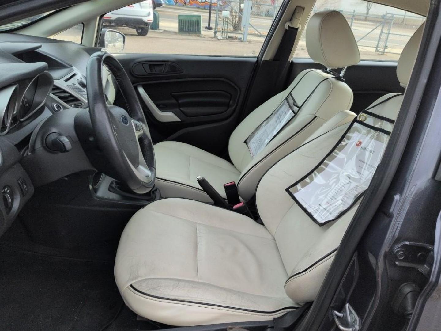 2013 BLUE Ford Fiesta Titanium (3FADP4CJ7DM) with an 4 Cyl, 1.6L engine, Manual transmission, located at 10890 W. Colfax Ave., Lakewood, CO, 80215, (303) 274-7692, 39.739914, -105.120132 - Photo#9