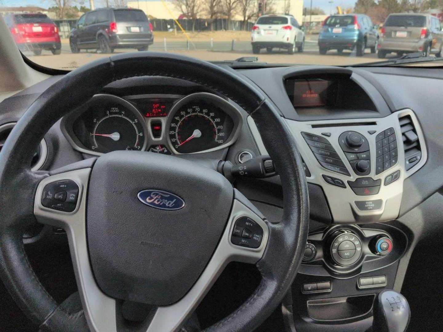 2013 BLUE Ford Fiesta Titanium (3FADP4CJ7DM) with an 4 Cyl, 1.6L engine, Manual transmission, located at 10890 W. Colfax Ave., Lakewood, CO, 80215, (303) 274-7692, 39.739914, -105.120132 - Photo#10