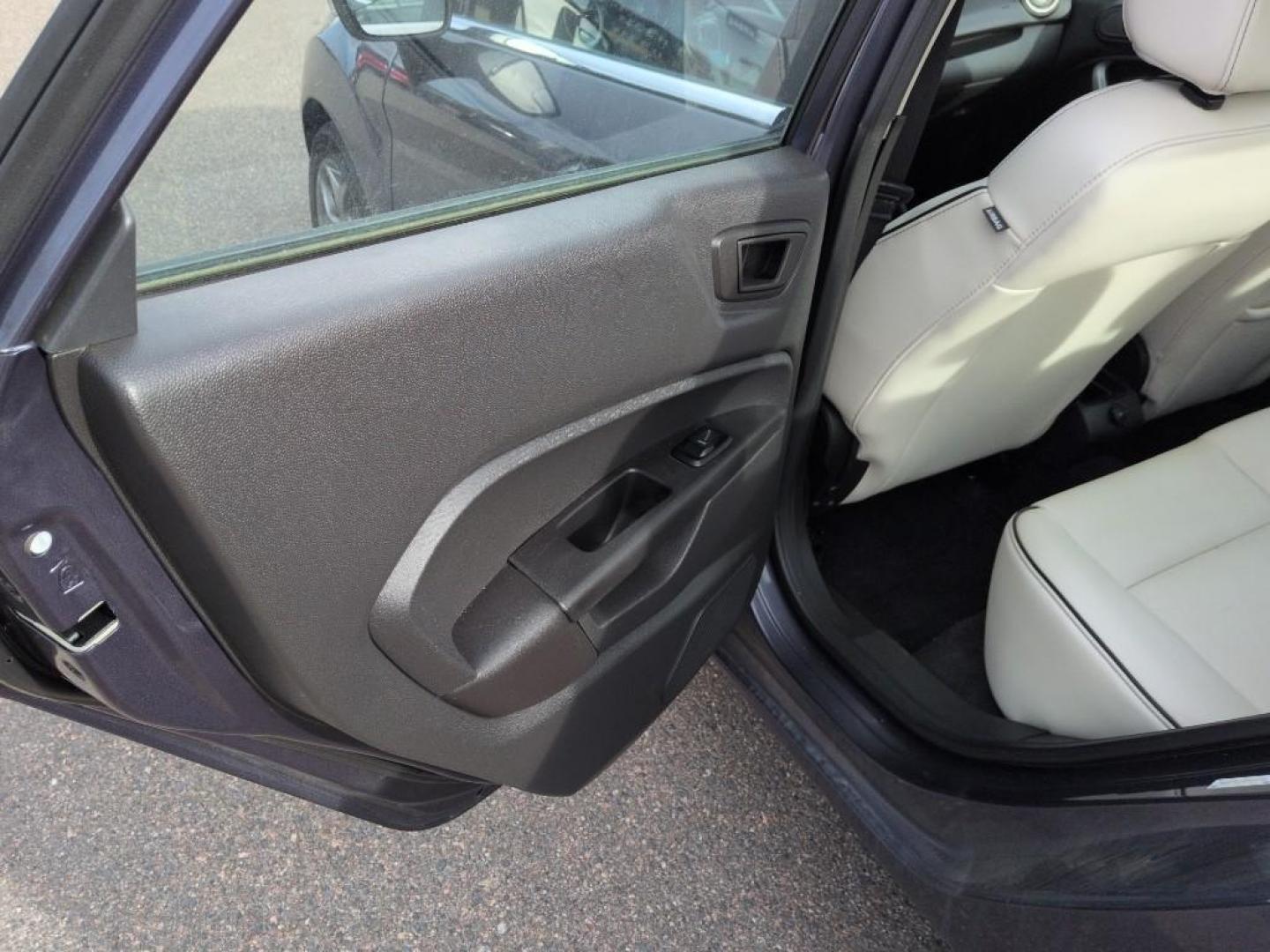 2013 BLUE Ford Fiesta Titanium (3FADP4CJ7DM) with an 4 Cyl, 1.6L engine, Manual transmission, located at 10890 W. Colfax Ave., Lakewood, CO, 80215, (303) 274-7692, 39.739914, -105.120132 - Photo#16