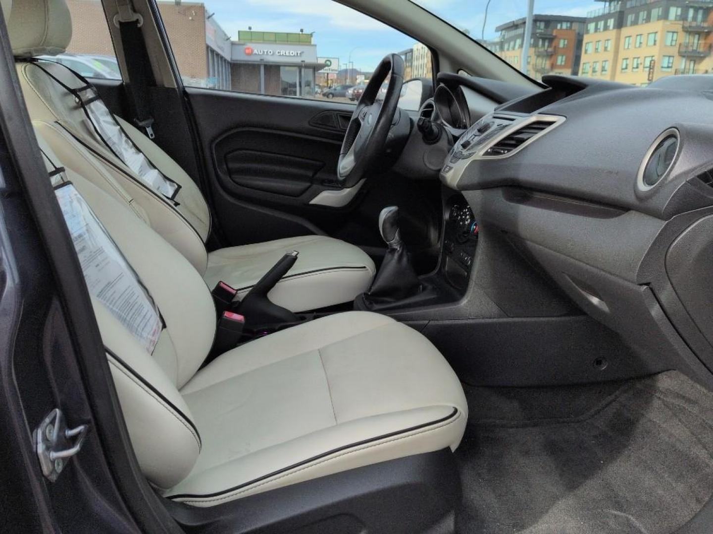 2013 BLUE Ford Fiesta Titanium (3FADP4CJ7DM) with an 4 Cyl, 1.6L engine, Manual transmission, located at 10890 W. Colfax Ave., Lakewood, CO, 80215, (303) 274-7692, 39.739914, -105.120132 - Photo#19