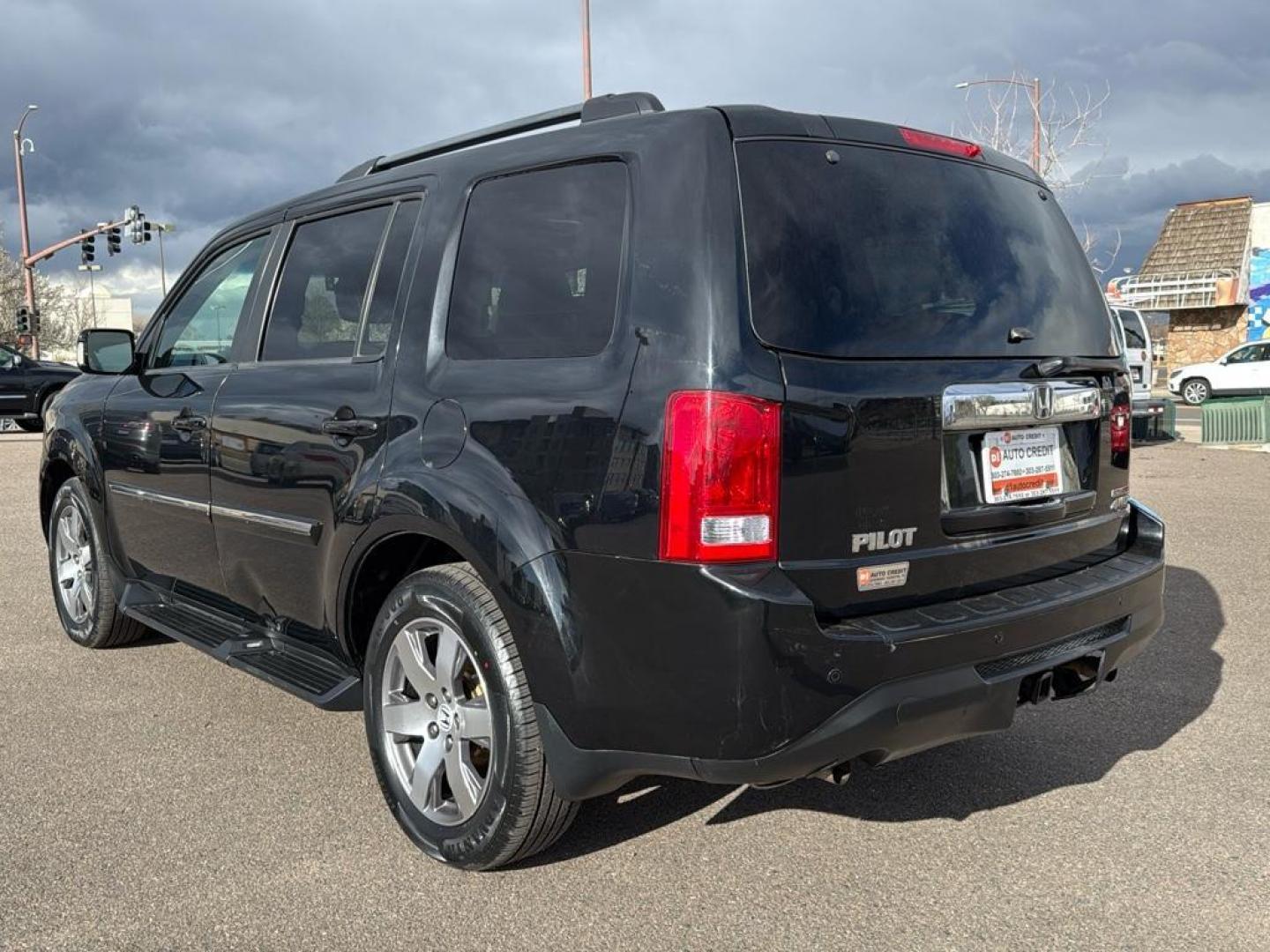 2014 BLACK Honda Pilot Touring-RES (5FNYF4H97EB) with an V6, 3.5L engine, Automatic transmission, located at 10890 W. Colfax Ave., Lakewood, CO, 80215, (303) 274-7692, 39.739914, -105.120132 - Photo#7