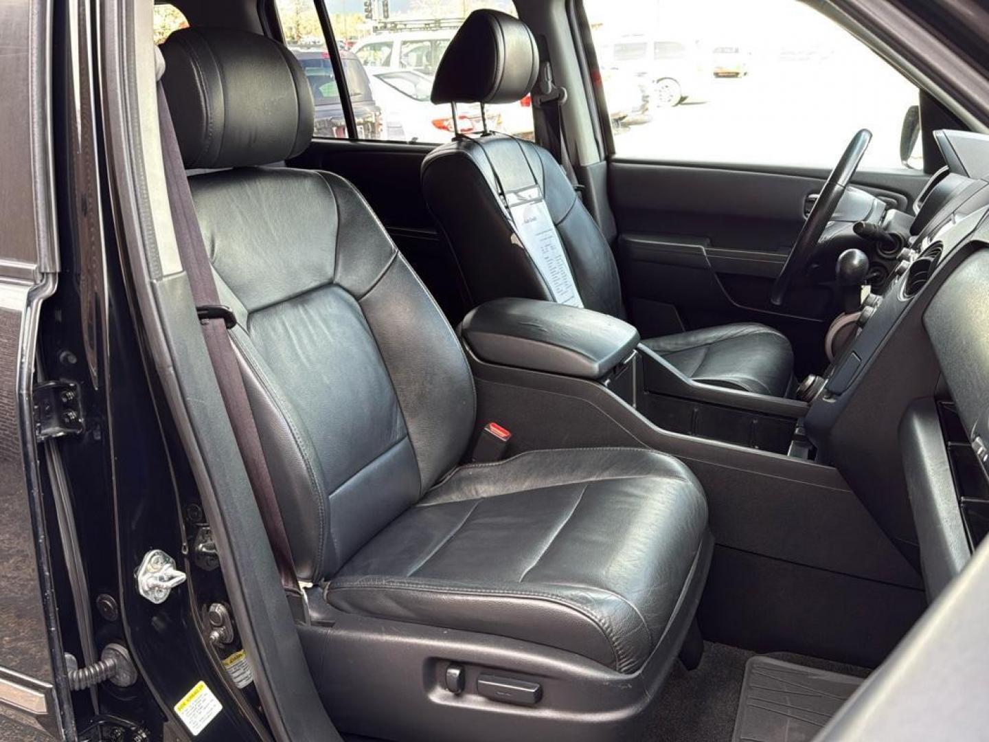 2014 BLACK Honda Pilot Touring-RES (5FNYF4H97EB) with an V6, 3.5L engine, Automatic transmission, located at 10890 W. Colfax Ave., Lakewood, CO, 80215, (303) 274-7692, 39.739914, -105.120132 - Photo#14