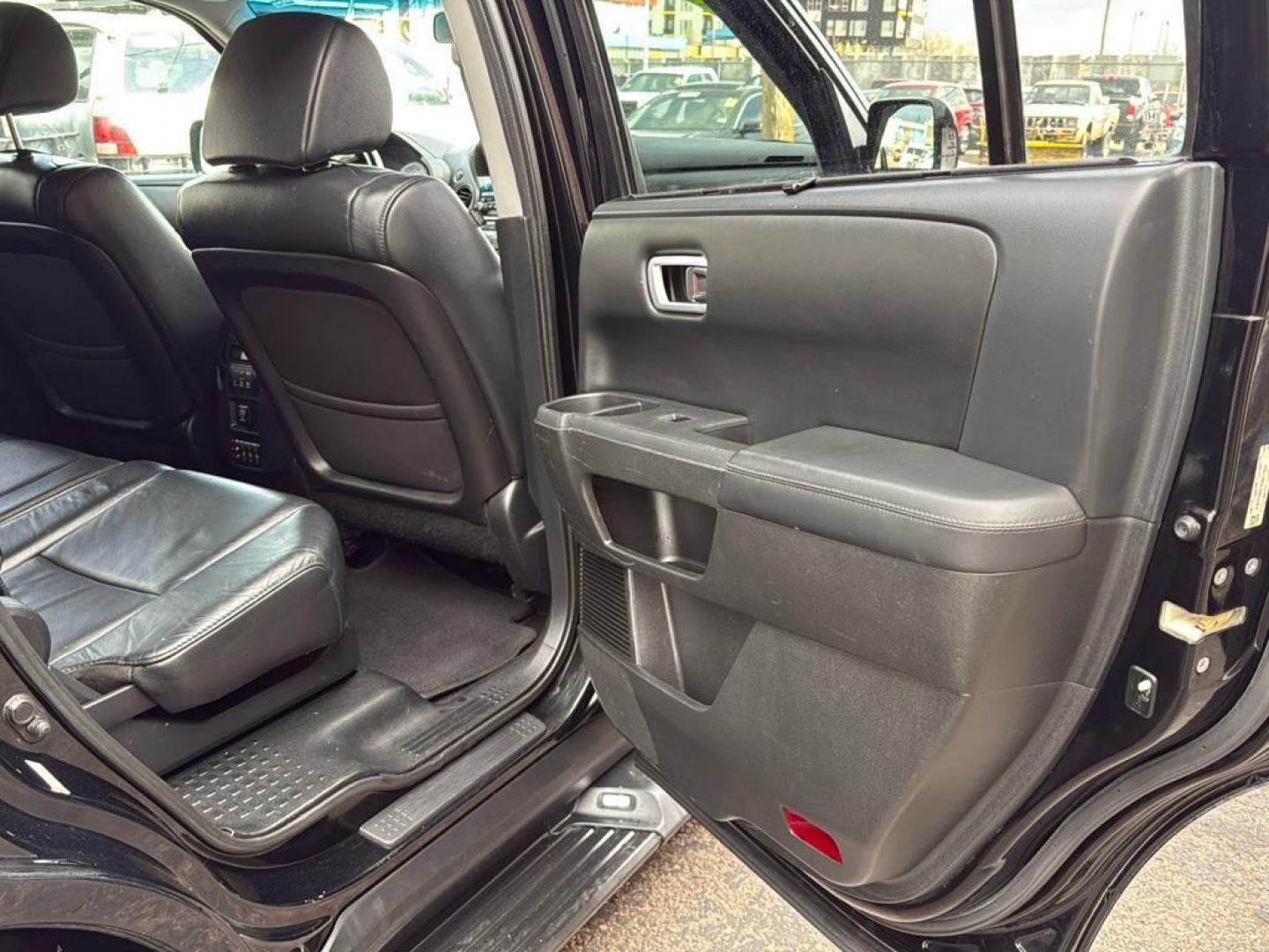 2014 BLACK Honda Pilot Touring-RES (5FNYF4H97EB) with an V6, 3.5L engine, Automatic transmission, located at 10890 W. Colfax Ave., Lakewood, CO, 80215, (303) 274-7692, 39.739914, -105.120132 - Photo#25