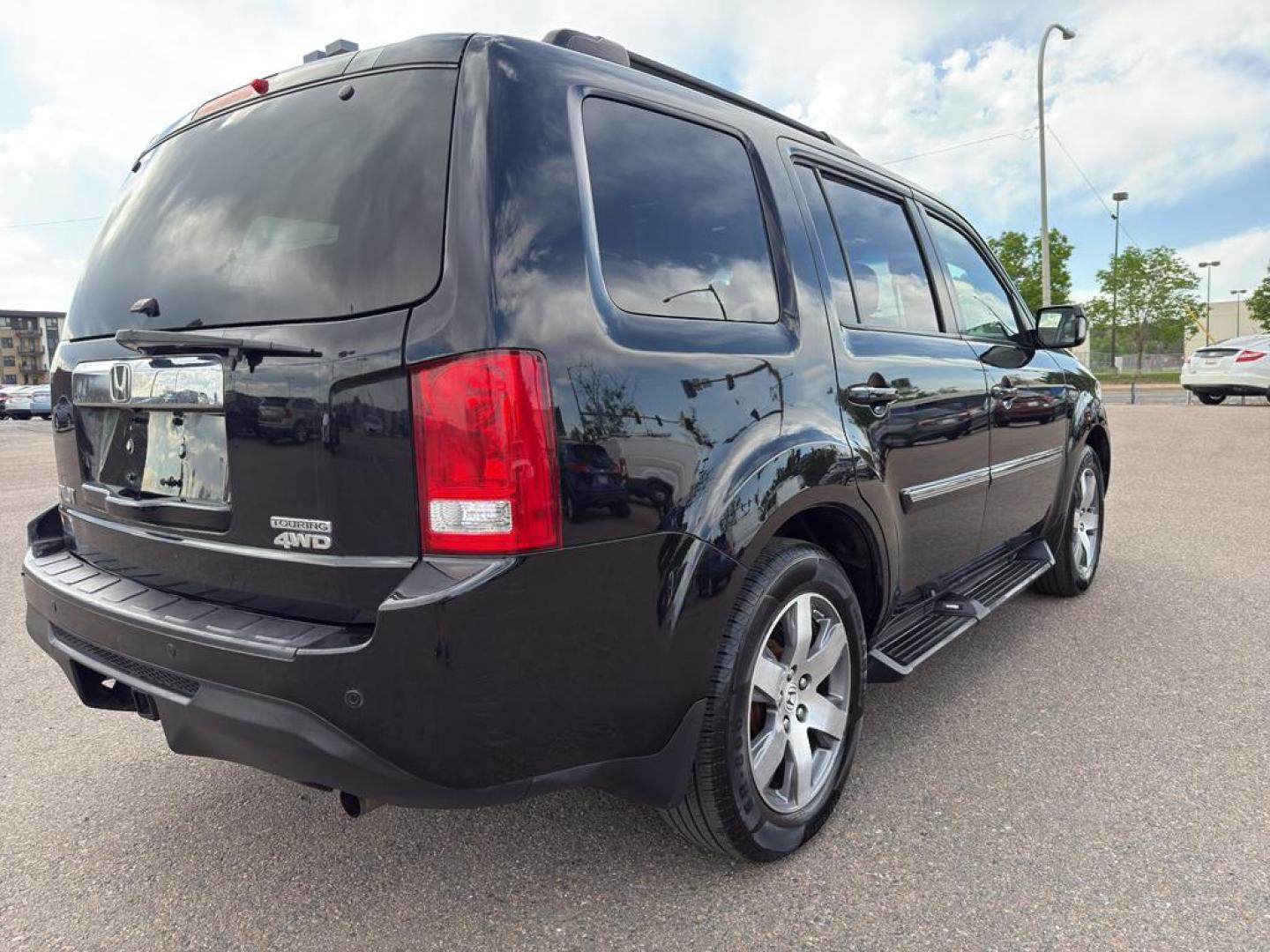 2014 BLACK /ACTUAL Honda Pilot Touring-RES (5FNYF4H97EB) with an V6, 3.5L engine, Automatic transmission, located at 10890 W. Colfax Ave., Lakewood, CO, 80215, (303) 274-7692, 39.739914, -105.120132 - Discover the perfect blend of style, comfort, and performance with this stunning 2014 Honda Pilot Touring-RES! This versatile SUV is designed to elevate your driving experience with its impeccable features and robust engineering. Under the hood, the Honda Pilot is powered by a dynamic V6, 3.5L engin - Photo#4