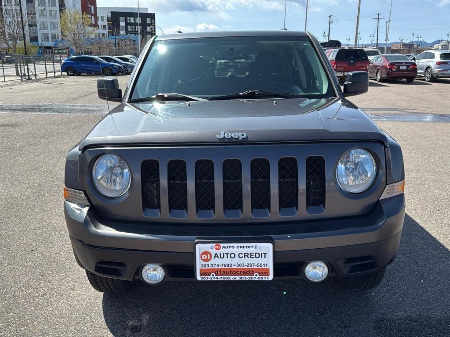 2015 GRAY Jeep Patriot Latitude (1C4NJRFB9FD) with an 4 Cyl, 2.4L engine, Manual transmission, located at 10890 W. Colfax Ave., Lakewood, CO, 80215, (303) 274-7692, 39.739914, -105.120132 - Photo#1