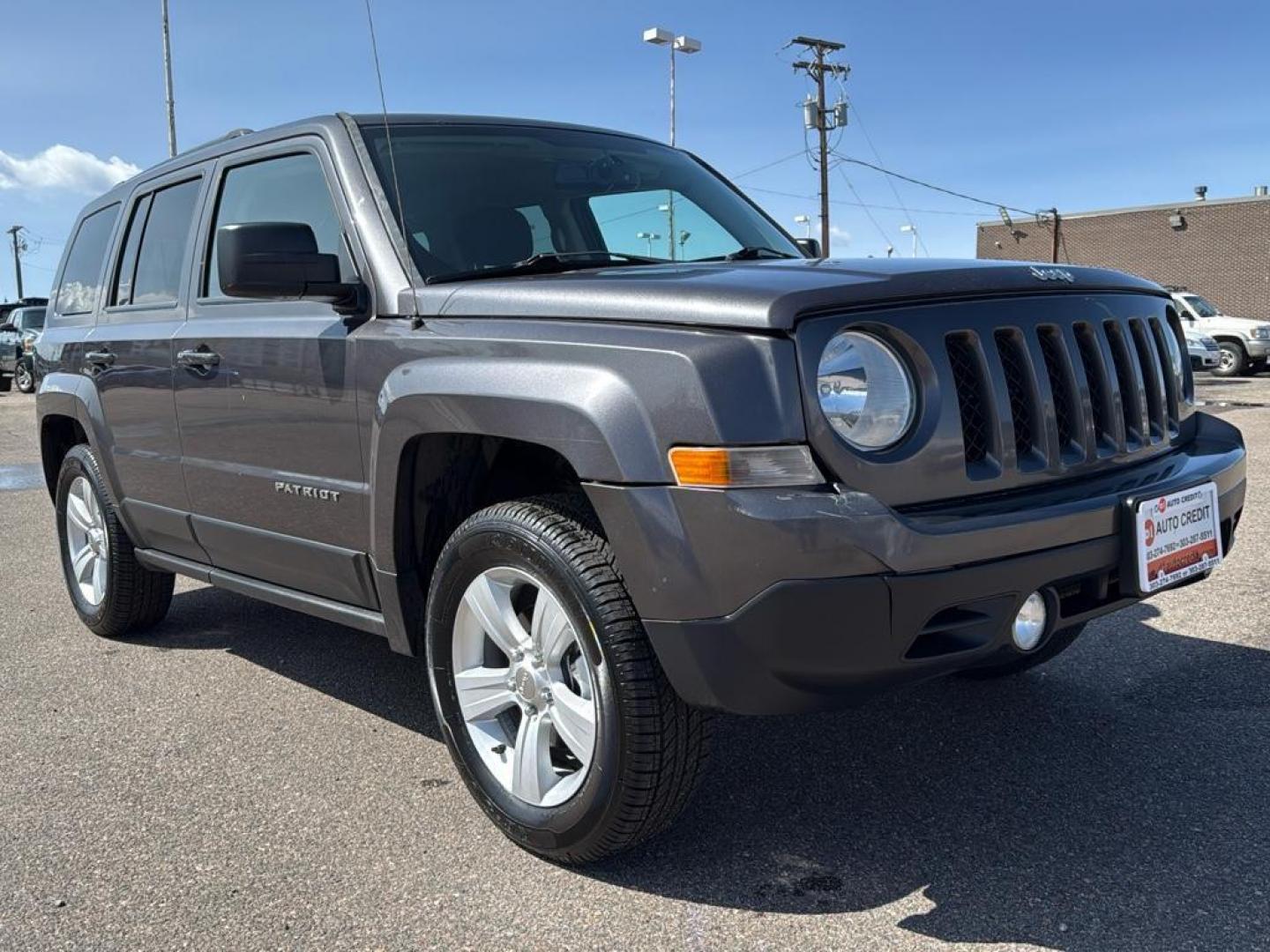 2015 GRAY Jeep Patriot Latitude (1C4NJRFB9FD) with an 4 Cyl, 2.4L engine, Manual transmission, located at 10890 W. Colfax Ave., Lakewood, CO, 80215, (303) 274-7692, 39.739914, -105.120132 - Photo#2