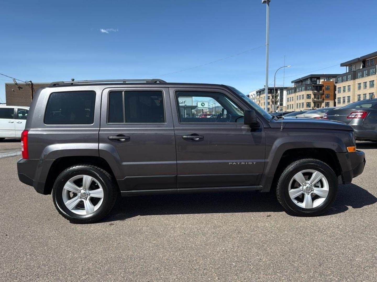 2015 GRAY Jeep Patriot Latitude (1C4NJRFB9FD) with an 4 Cyl, 2.4L engine, Manual transmission, located at 10890 W. Colfax Ave., Lakewood, CO, 80215, (303) 274-7692, 39.739914, -105.120132 - Photo#3