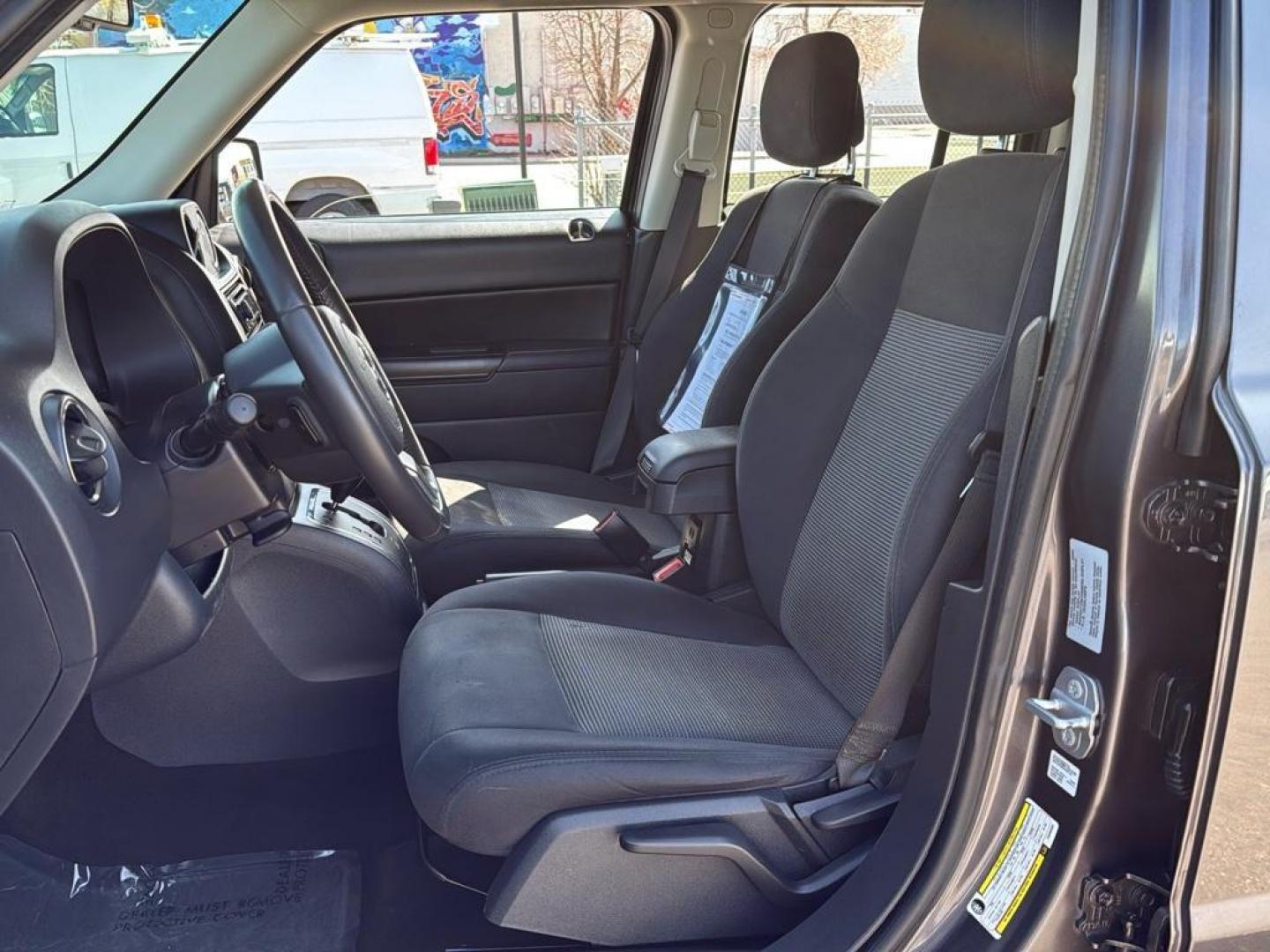 2015 GRAY Jeep Patriot Latitude (1C4NJRFB9FD) with an 4 Cyl, 2.4L engine, Manual transmission, located at 10890 W. Colfax Ave., Lakewood, CO, 80215, (303) 274-7692, 39.739914, -105.120132 - Photo#9