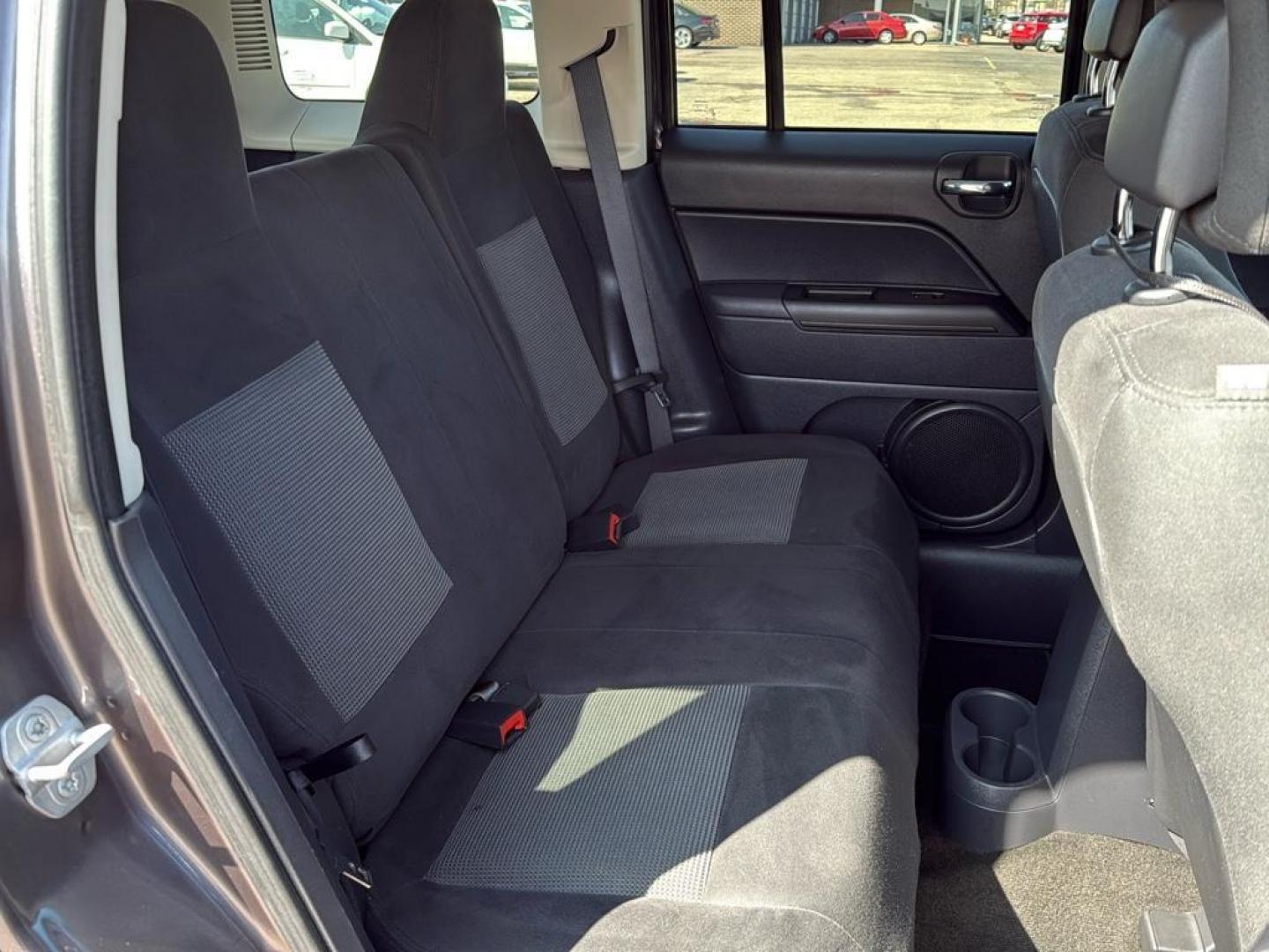 2015 GRAY Jeep Patriot Latitude (1C4NJRFB9FD) with an 4 Cyl, 2.4L engine, Manual transmission, located at 10890 W. Colfax Ave., Lakewood, CO, 80215, (303) 274-7692, 39.739914, -105.120132 - Photo#11