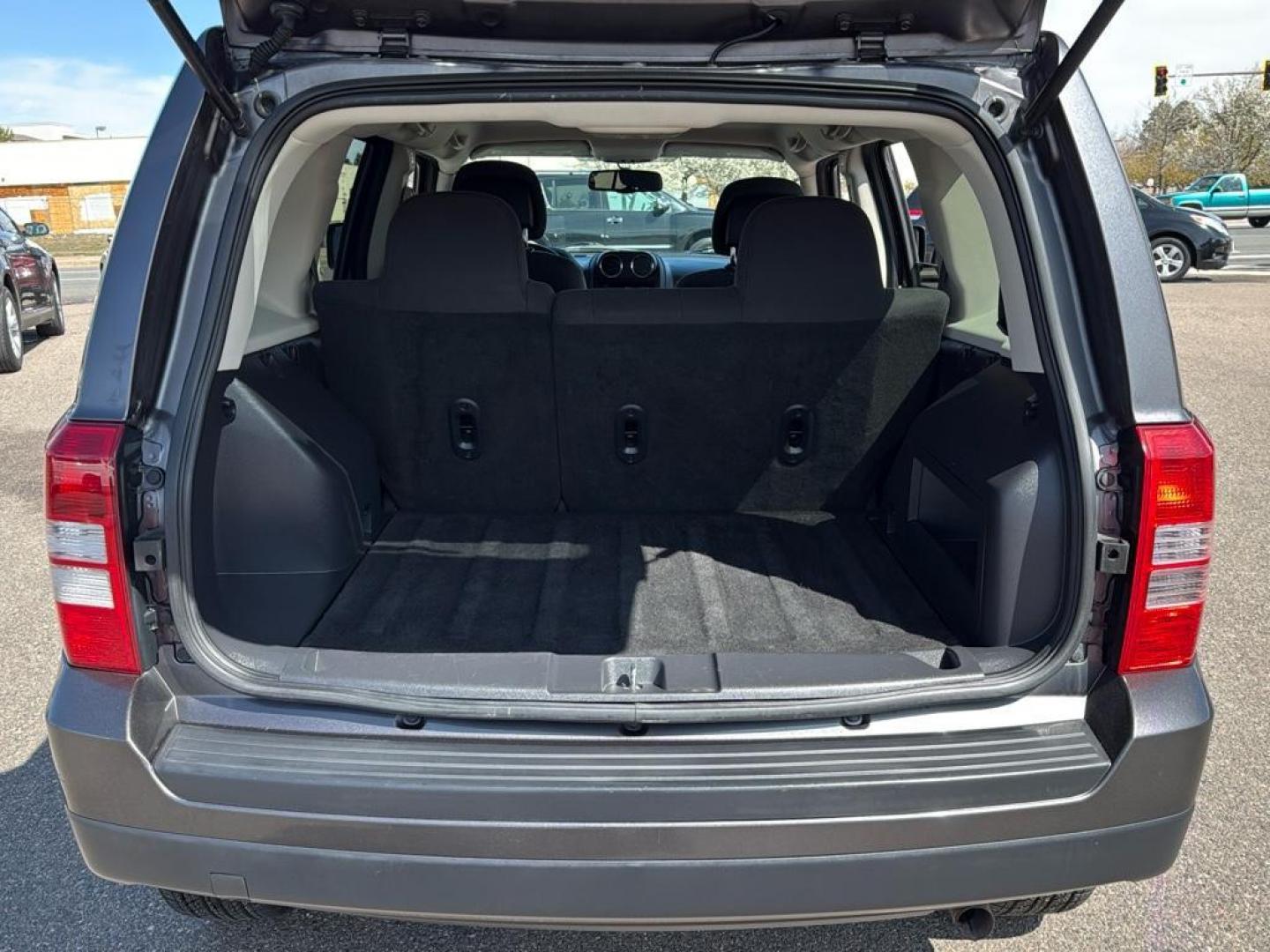 2015 GRAY Jeep Patriot Latitude (1C4NJRFB9FD) with an 4 Cyl, 2.4L engine, Manual transmission, located at 10890 W. Colfax Ave., Lakewood, CO, 80215, (303) 274-7692, 39.739914, -105.120132 - Photo#12