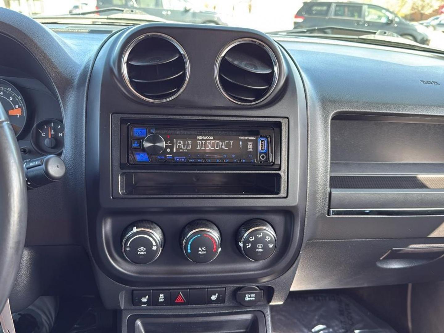 2015 GRAY Jeep Patriot Latitude (1C4NJRFB9FD) with an 4 Cyl, 2.4L engine, Manual transmission, located at 10890 W. Colfax Ave., Lakewood, CO, 80215, (303) 274-7692, 39.739914, -105.120132 - Photo#14