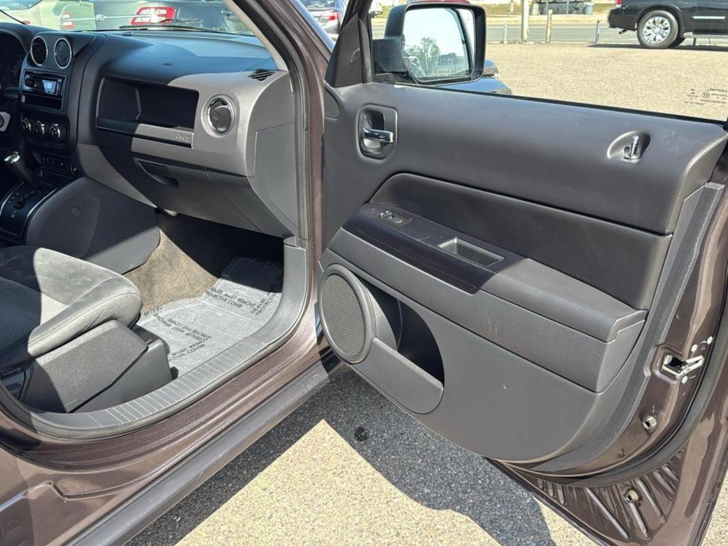 2015 GRAY Jeep Patriot Latitude (1C4NJRFB9FD) with an 4 Cyl, 2.4L engine, Manual transmission, located at 10890 W. Colfax Ave., Lakewood, CO, 80215, (303) 274-7692, 39.739914, -105.120132 - Photo#19