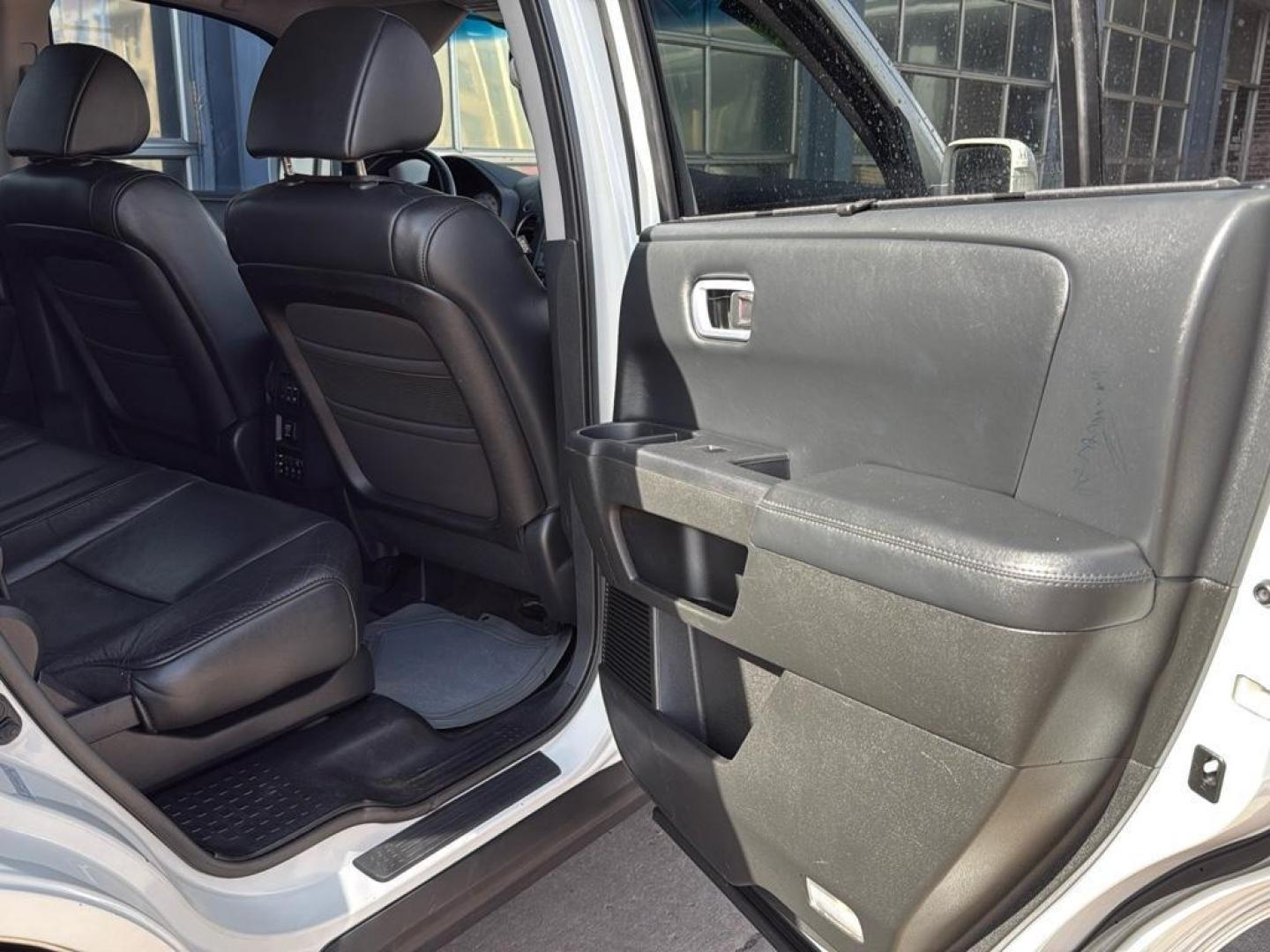 2011 WHITE Honda Pilot Touring-RES (5FNYF4H9XBB) with an V6, 3.5L engine, Automatic transmission, located at 10890 W. Colfax Ave., Lakewood, CO, 80215, (303) 274-7692, 39.739914, -105.120132 - Photo#31