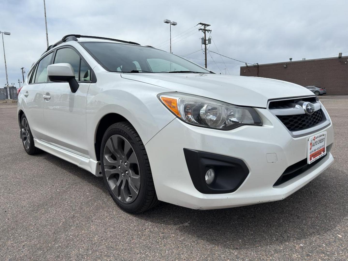 2013 WHITE Subaru Impreza Sport (JF1GPAL63DH) with an 4 Cyl, 2.0L engine, Automatic transmission, located at 10890 W. Colfax Ave., Lakewood, CO, 80215, (303) 274-7692, 39.739914, -105.120132 - Photo#2