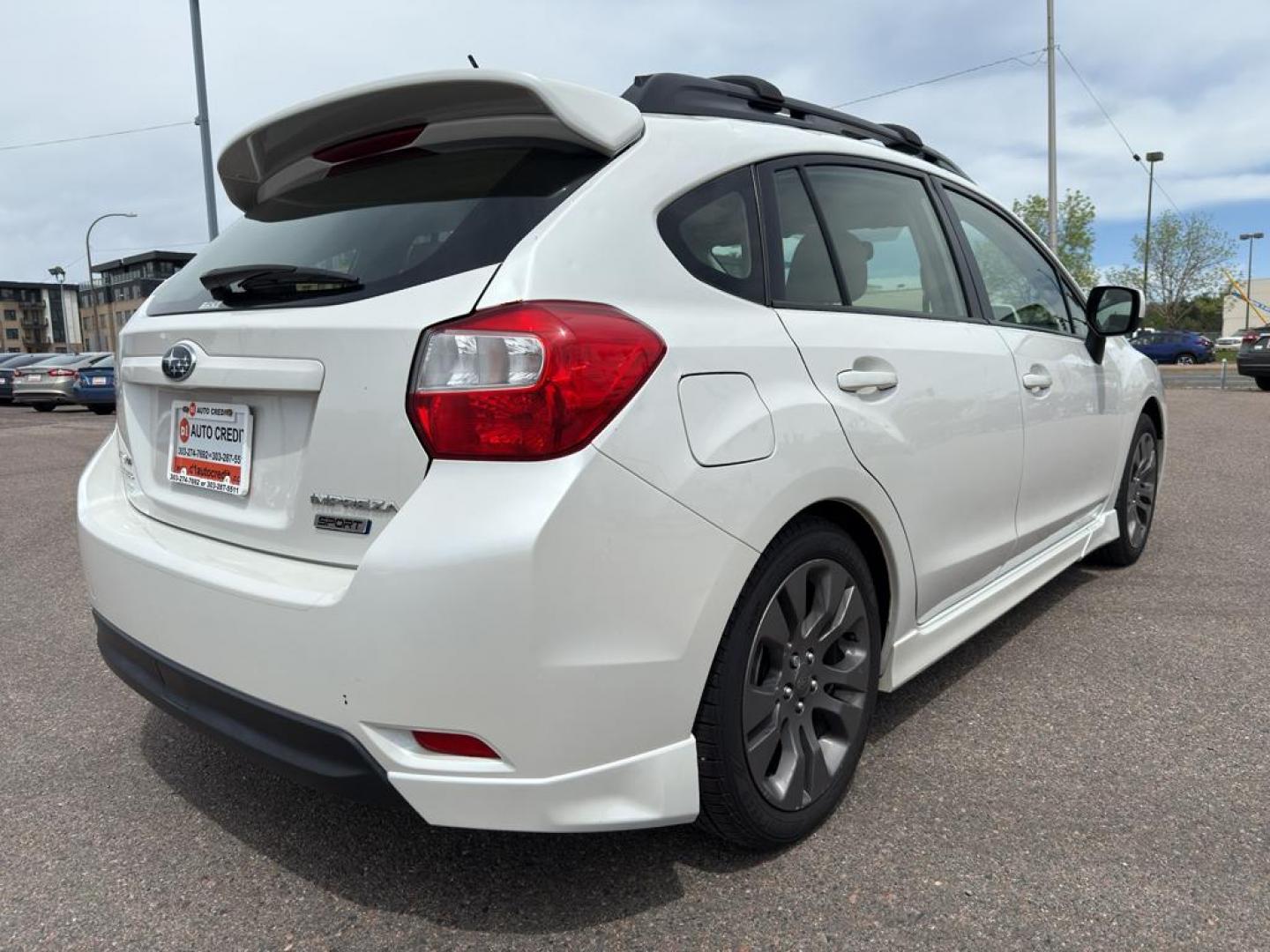 2013 WHITE Subaru Impreza Sport (JF1GPAL63DH) with an 4 Cyl, 2.0L engine, Automatic transmission, located at 10890 W. Colfax Ave., Lakewood, CO, 80215, (303) 274-7692, 39.739914, -105.120132 - Photo#4