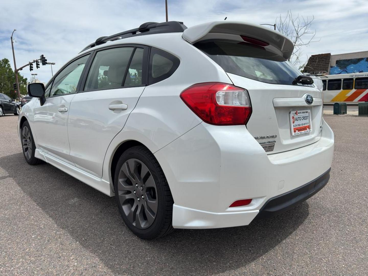 2013 WHITE Subaru Impreza Sport (JF1GPAL63DH) with an 4 Cyl, 2.0L engine, Automatic transmission, located at 10890 W. Colfax Ave., Lakewood, CO, 80215, (303) 274-7692, 39.739914, -105.120132 - Photo#6