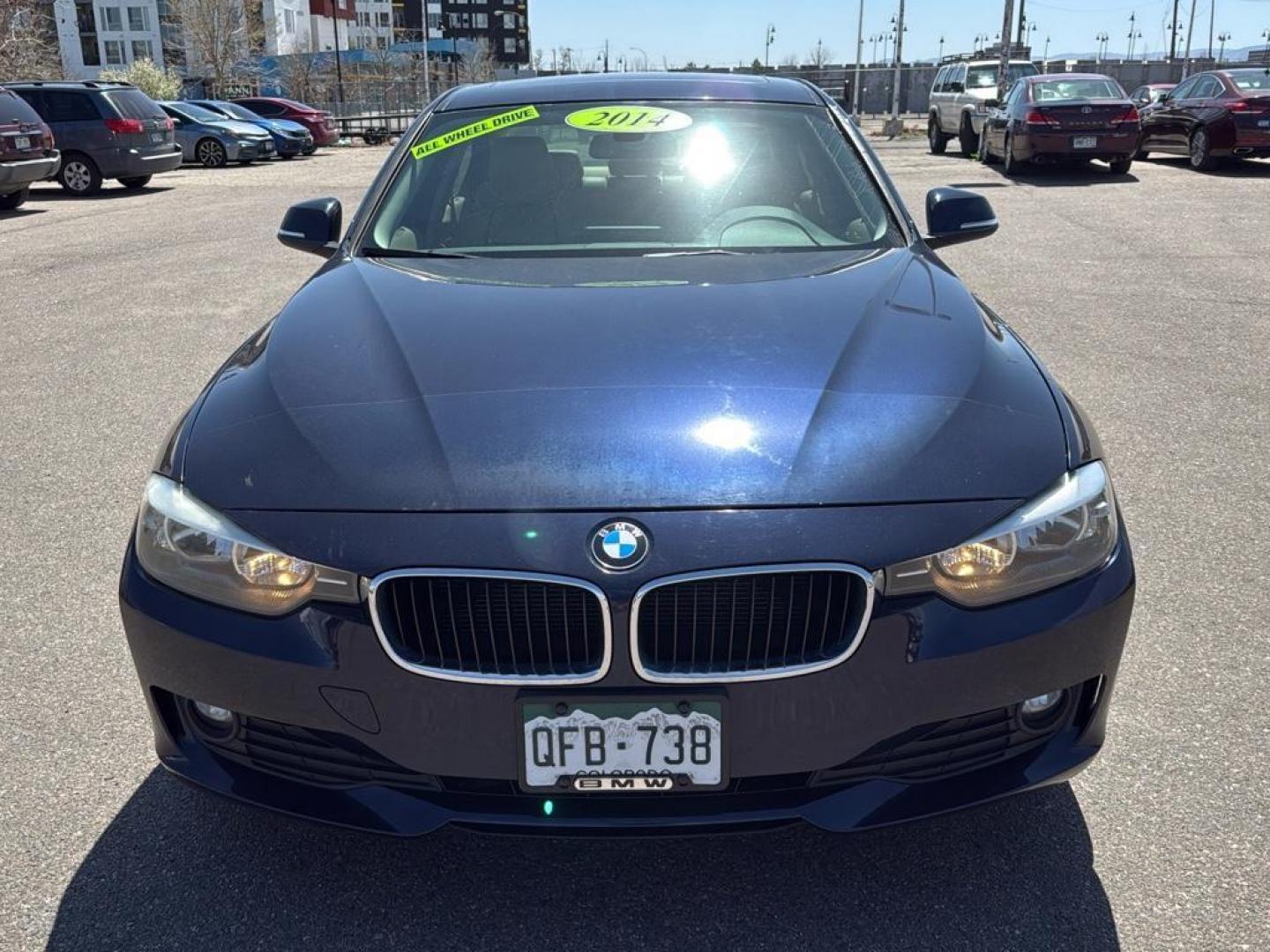 2014 BLUE /TAN BMW 3 series 320i XDrive (WBA3C3C59EK) with an 4 Cyl, 2.0L engine, Automatic transmission, located at 10890 W. Colfax Ave., Lakewood, CO, 80215, (303) 274-7692, 39.739914, -105.120132 - <b>Summary</b><br>Check out this low mile, All Wheel Drive BMW 3 Series. Loaded with heated leather seats, Sun Roof, Bluetoothe Audio and much more. One Owner, Clean Colorado tile with no accidents. This one has been very well maintained and tons of records on the FREE Carfax. Heated Leather Seats, - Photo#1