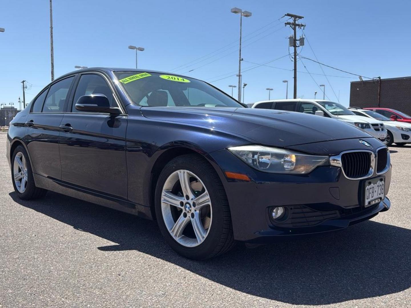 2014 BLUE /TAN BMW 3 series 320i XDrive (WBA3C3C59EK) with an 4 Cyl, 2.0L engine, Automatic transmission, located at 10890 W. Colfax Ave., Lakewood, CO, 80215, (303) 274-7692, 39.739914, -105.120132 - <b>Summary</b><br>Check out this low mile, All Wheel Drive BMW 3 Series. Loaded with heated leather seats, Sun Roof, Bluetoothe Audio and much more. One Owner, Clean Colorado tile with no accidents. This one has been very well maintained and tons of records on the FREE Carfax. Heated Leather Seats, - Photo#2