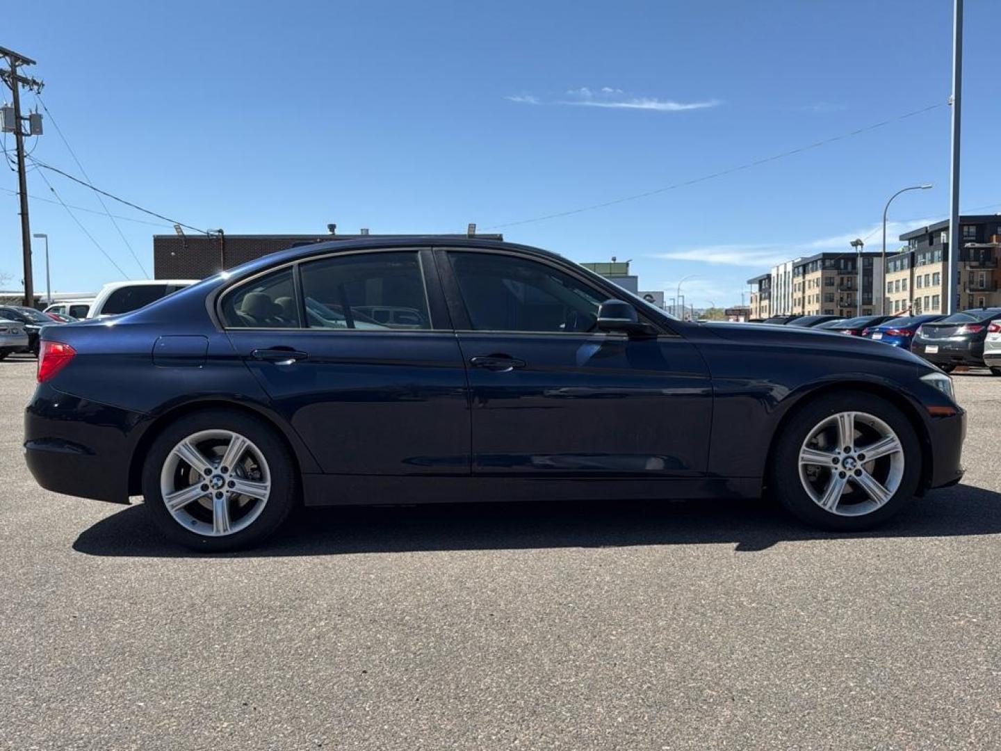 2014 BLUE /TAN BMW 3 series 320i XDrive (WBA3C3C59EK) with an 4 Cyl, 2.0L engine, Automatic transmission, located at 10890 W. Colfax Ave., Lakewood, CO, 80215, (303) 274-7692, 39.739914, -105.120132 - <b>Summary</b><br>Check out this low mile, All Wheel Drive BMW 3 Series. Loaded with heated leather seats, Sun Roof, Bluetoothe Audio and much more. One Owner, Clean Colorado tile with no accidents. This one has been very well maintained and tons of records on the FREE Carfax. Heated Leather Seats, - Photo#3